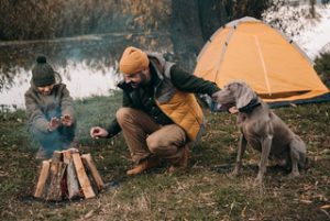 Camping with Dog Starting Fire